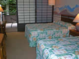 Double beds in a hotel room at Waikiki Beach